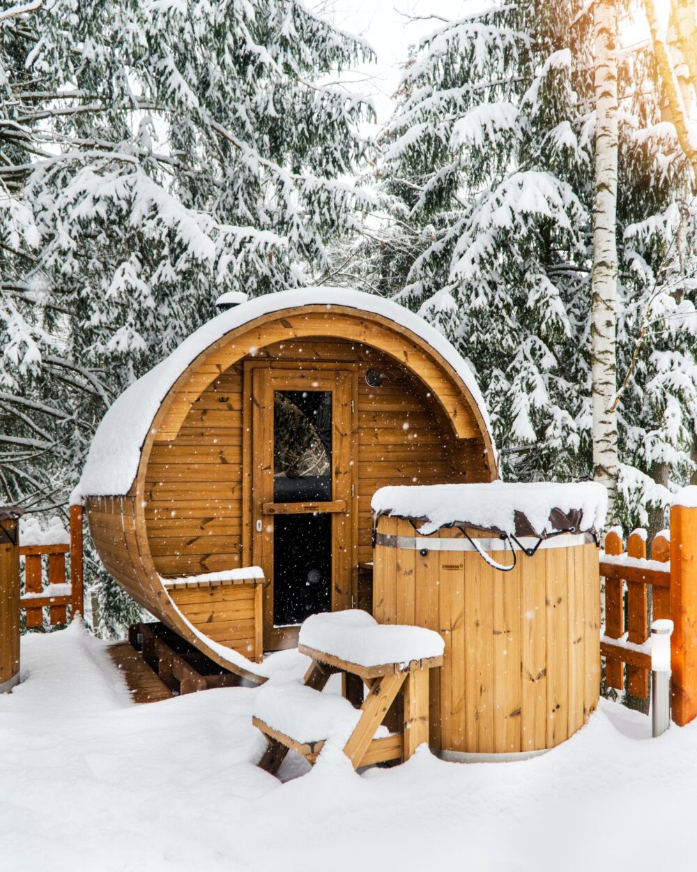 Neptune saunas - outdoor barrel sauna in snow - sauna maintenance guide article