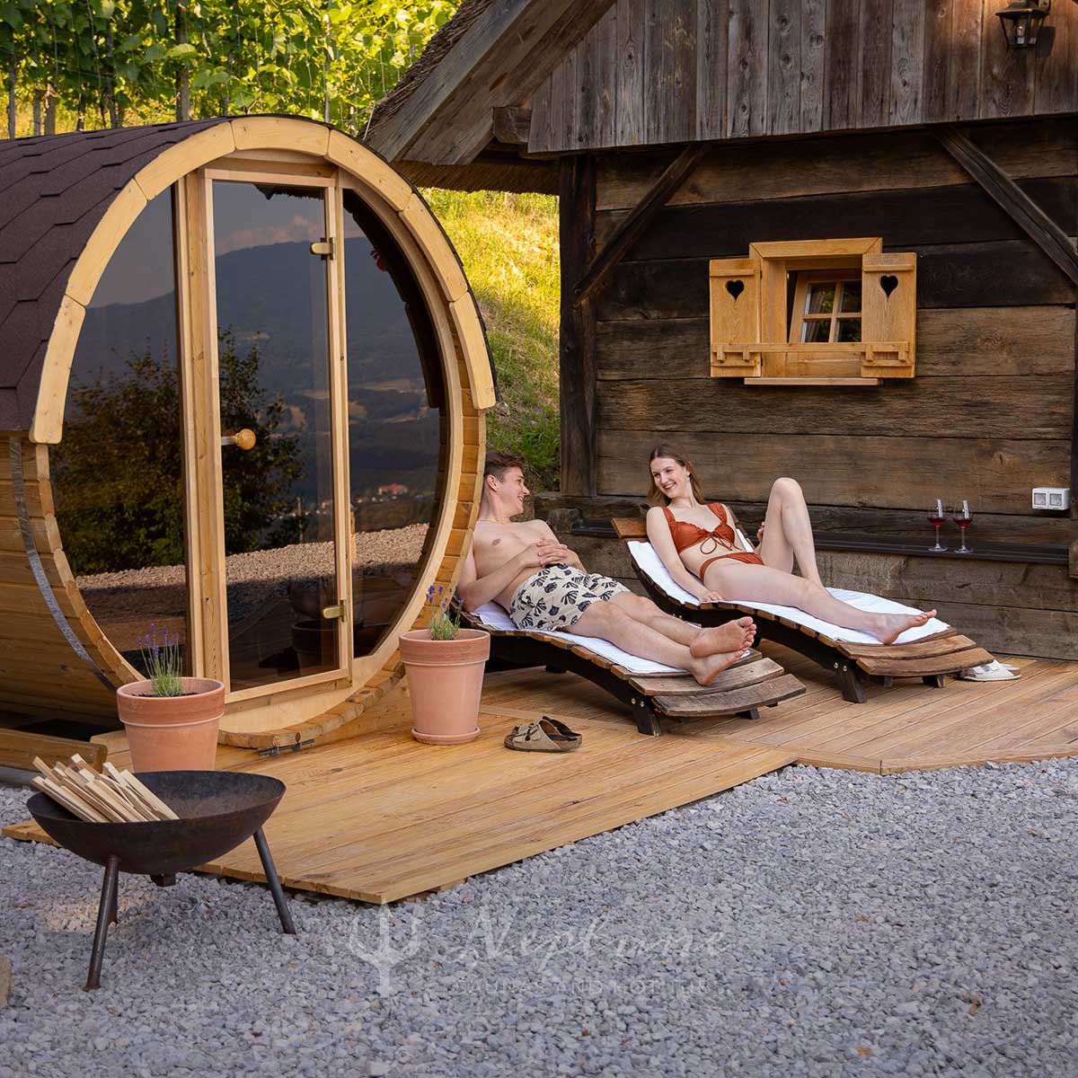 neptune sauna supplier - wholesale saunas for hospitality - couple on sunbeds next to malmo 2 person sauna