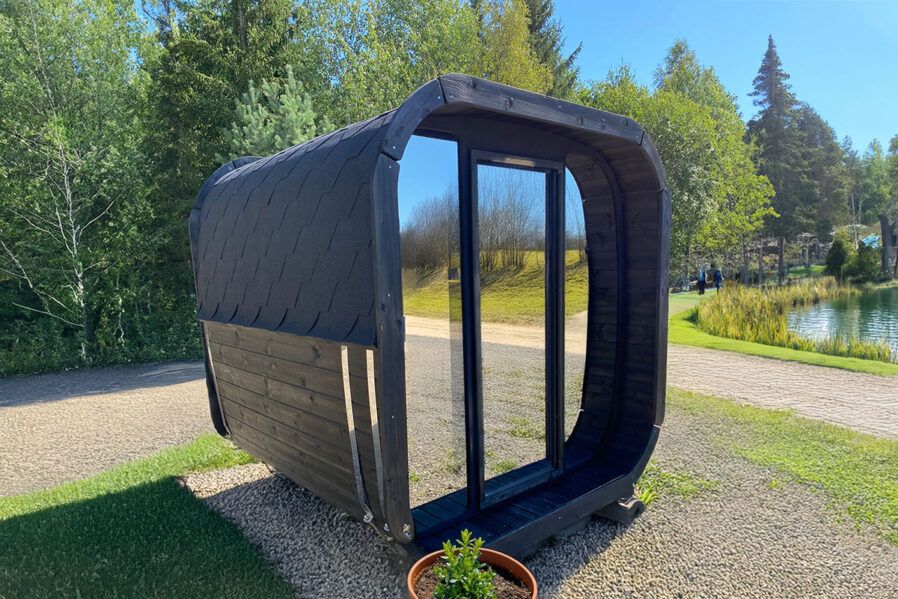 Lahti Ooutdoor Cube Sauna - neptune saunas and hot tubs photo - with mirrored glass front and black painted exterior