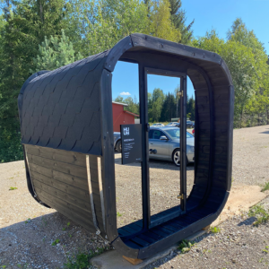 Lahti outdoor cube sauna - neptune saunas and hot tubs - photo with mirrored glass front and black exterior