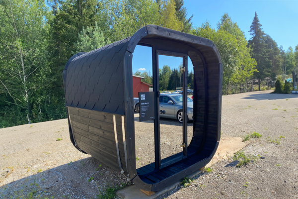 Lahti outdoor cube sauna - neptune saunas and hot tubs - photo with mirrored glass front and black exterior